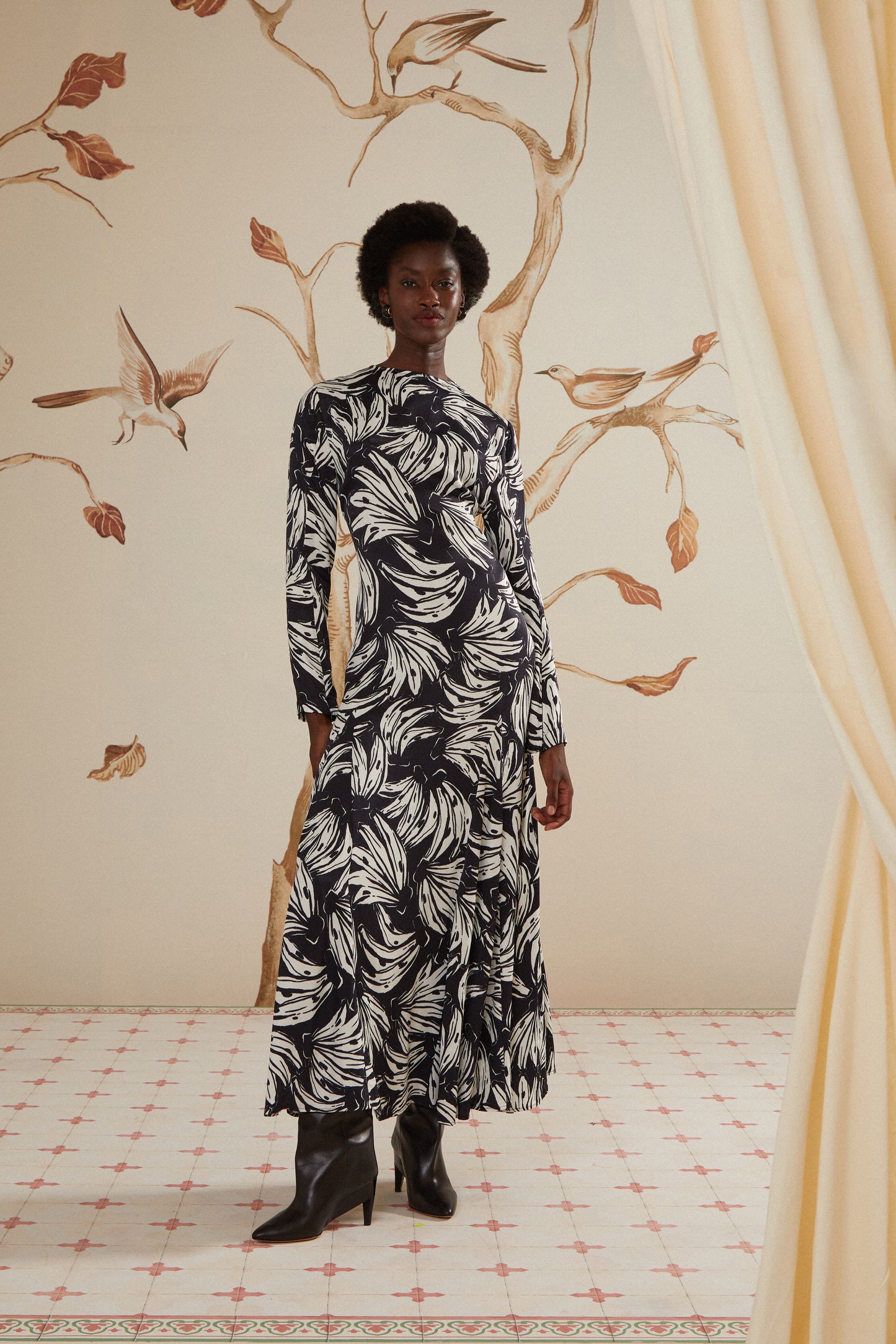 FARM Rio model wearing the Bossa Banana Black Midi Dress