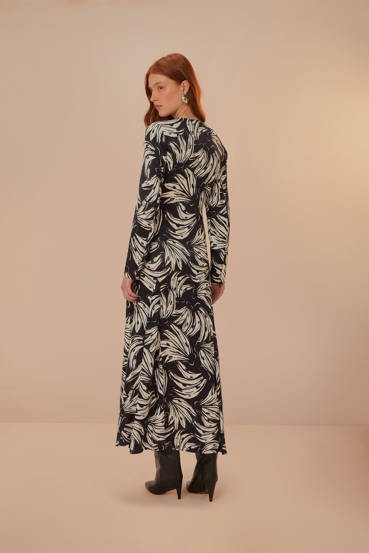 FARM Rio model wearing the Bossa Banana Black Midi Dress