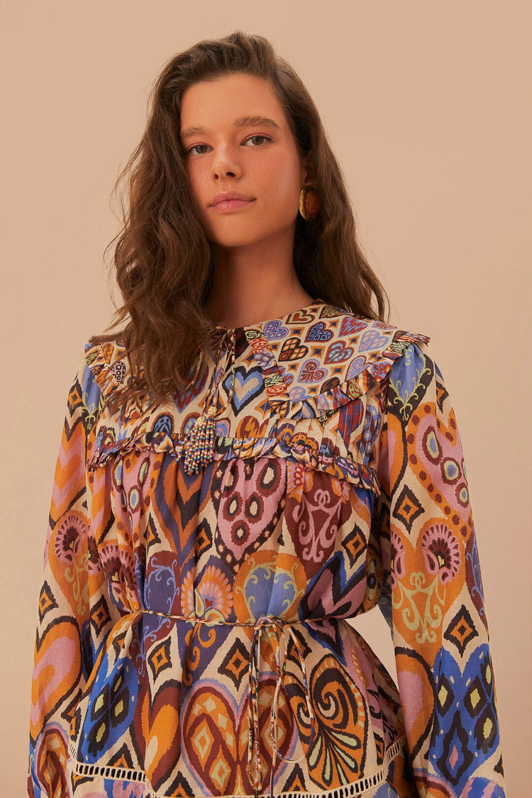 FARM Rio model wearing the Cream Hearts Ikat Blouse