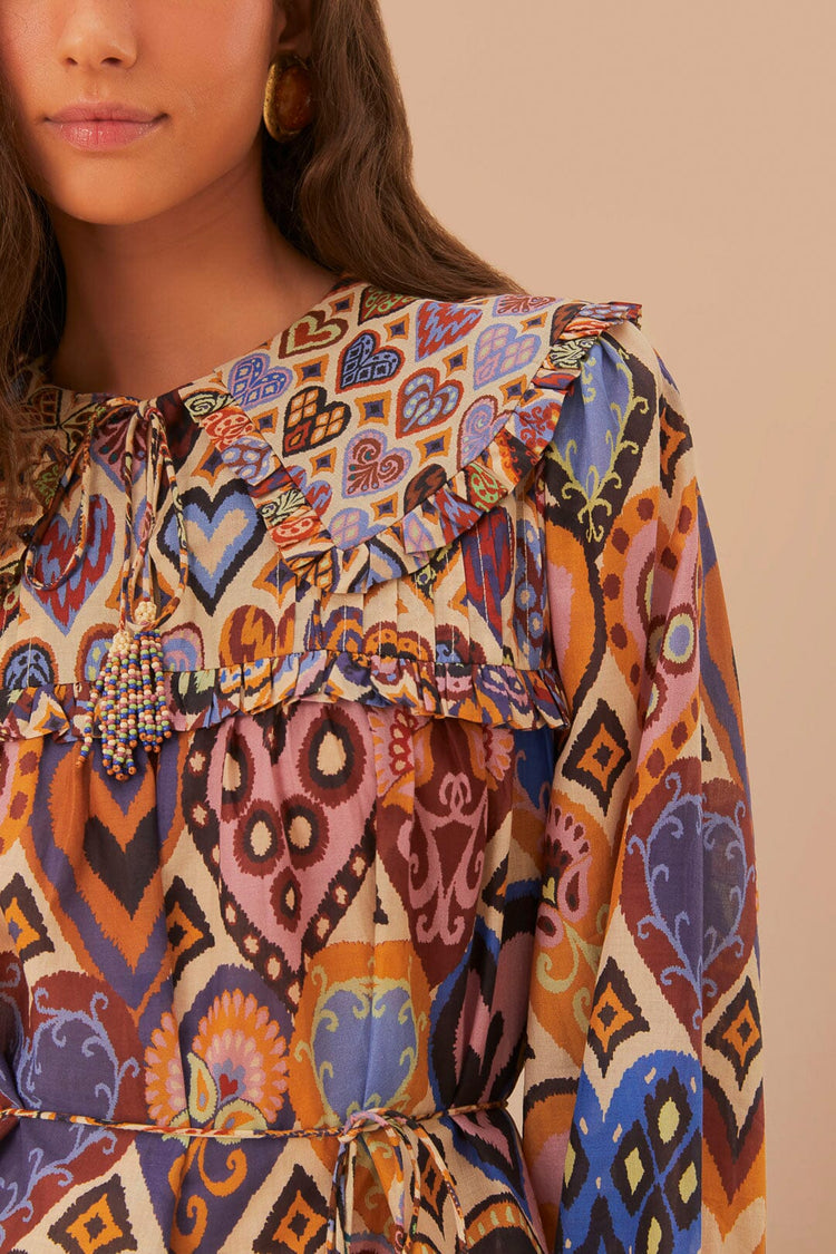 FARM Rio model wearing the Cream Hearts Ikat Blouse