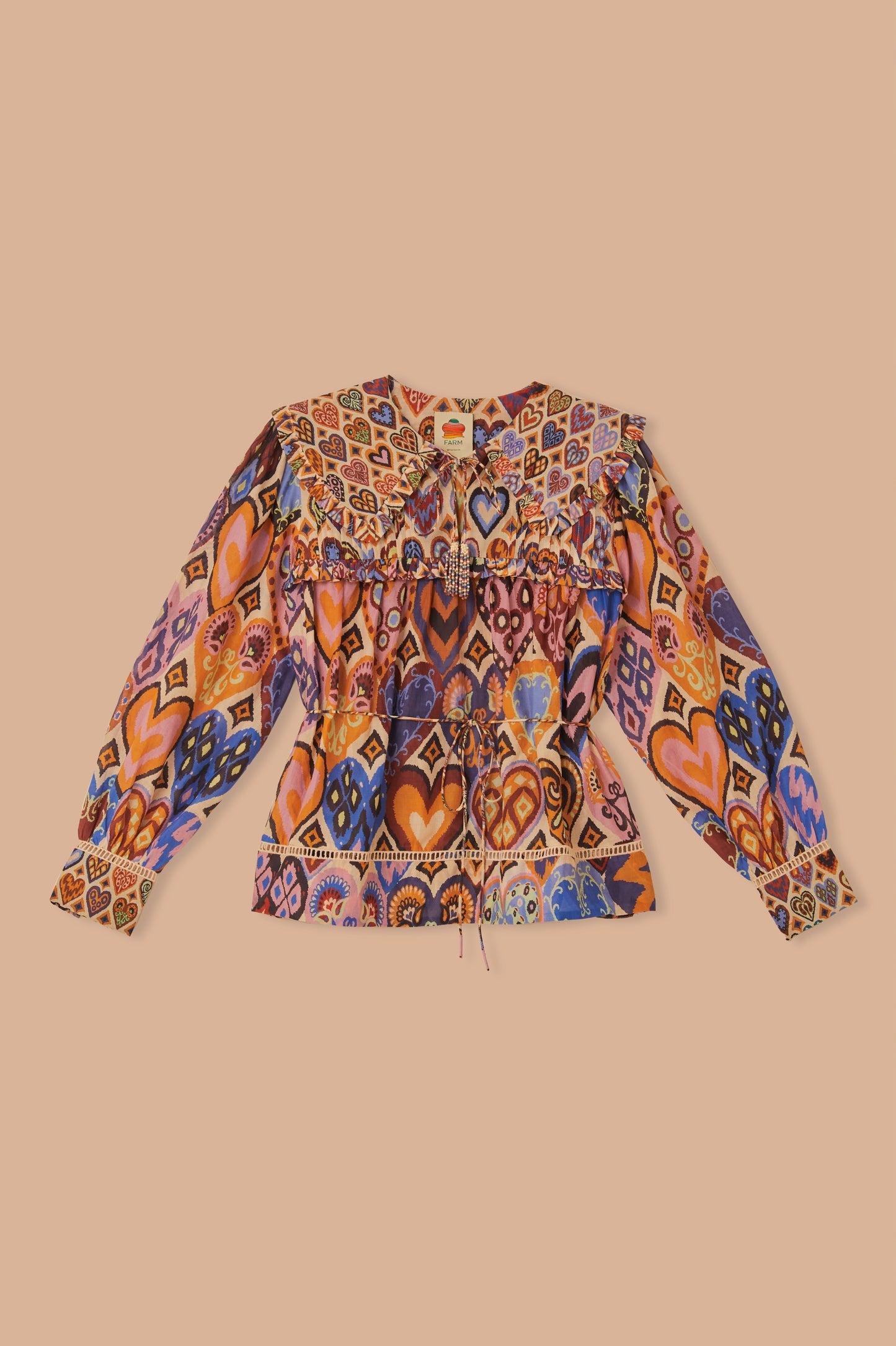 FARM Rio model wearing the Cream Hearts Ikat Blouse