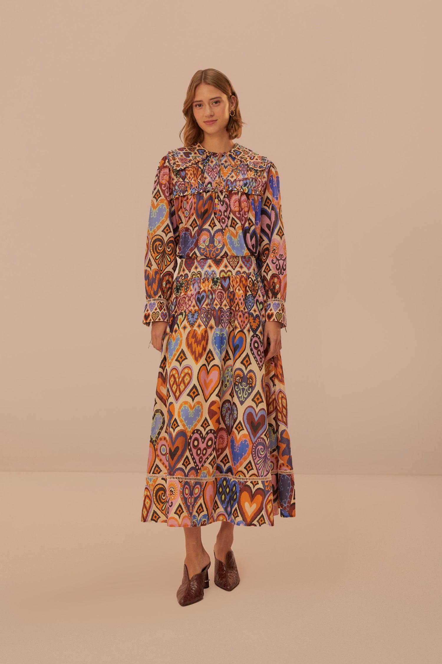 FARM Rio model wearing the Hearts Ikat Cream Midi Skirt
