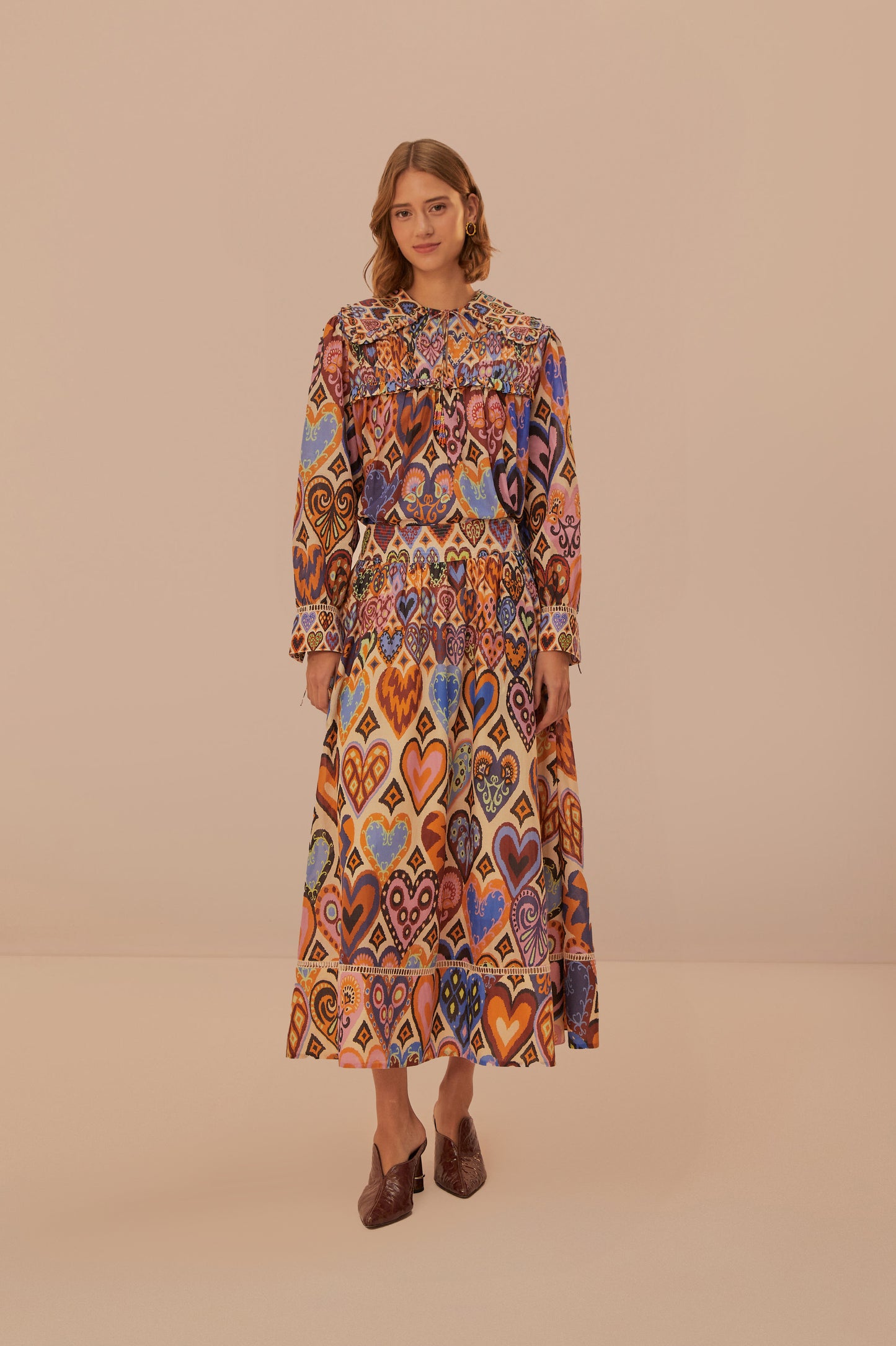 FARM Rio model wearing the Hearts Ikat Cream Midi Skirt