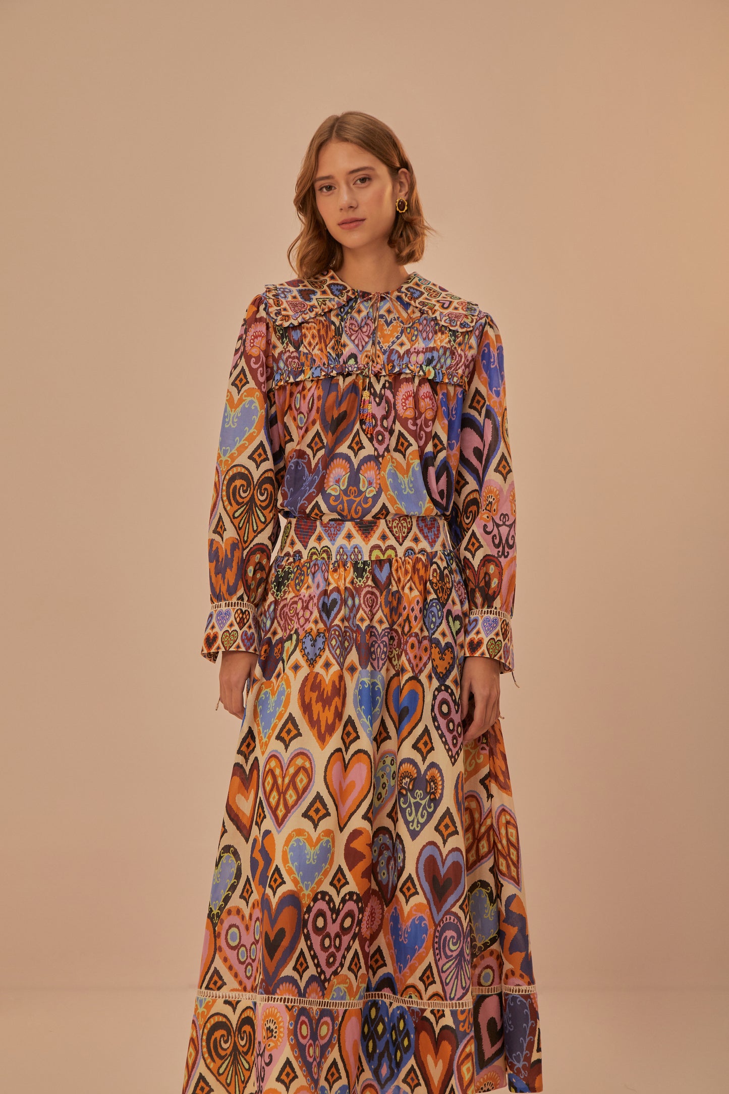 FARM Rio model wearing the Hearts Ikat Cream Midi Skirt