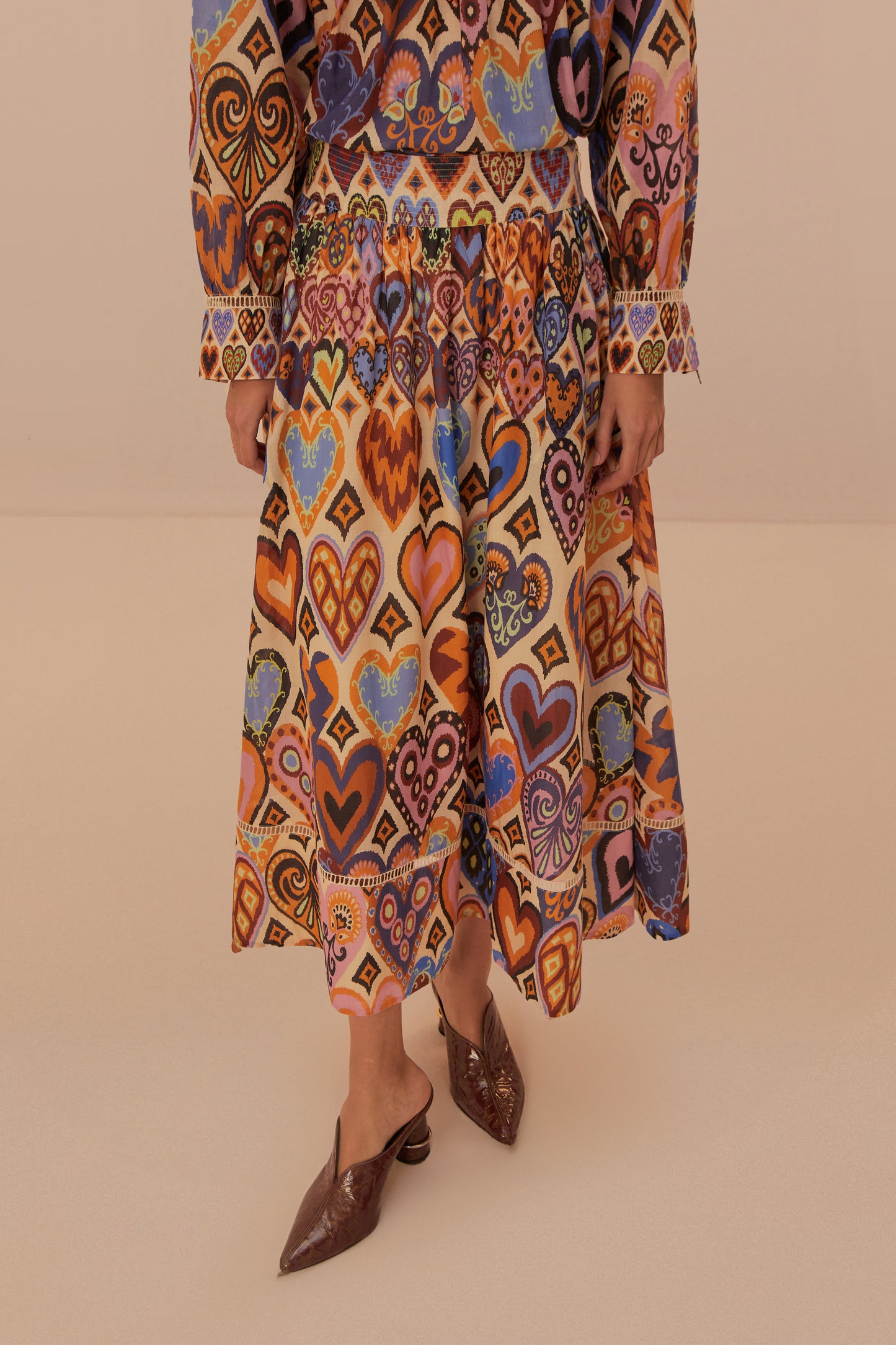FARM Rio model wearing the Hearts Ikat Cream Midi Skirt