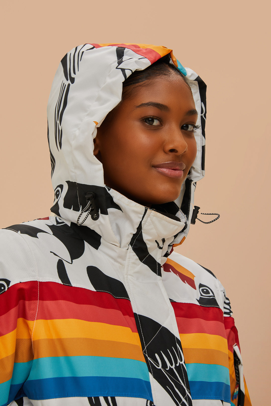 FARM Rio model wearing the Toucans Rainbow Ski Jumpsuit