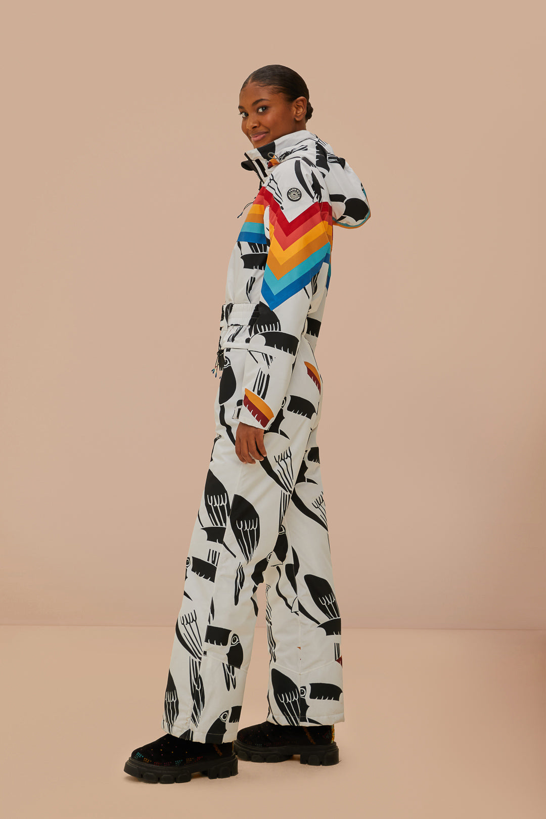 FARM Rio model wearing the Toucans Rainbow Ski Jumpsuit