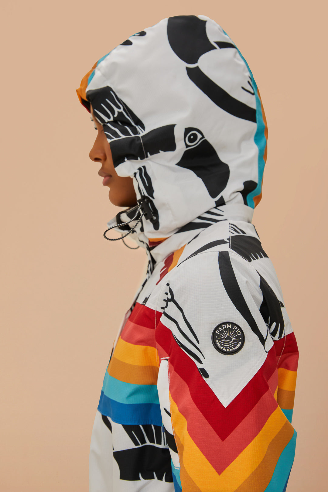 FARM Rio model wearing the Toucans Rainbow Ski Jumpsuit