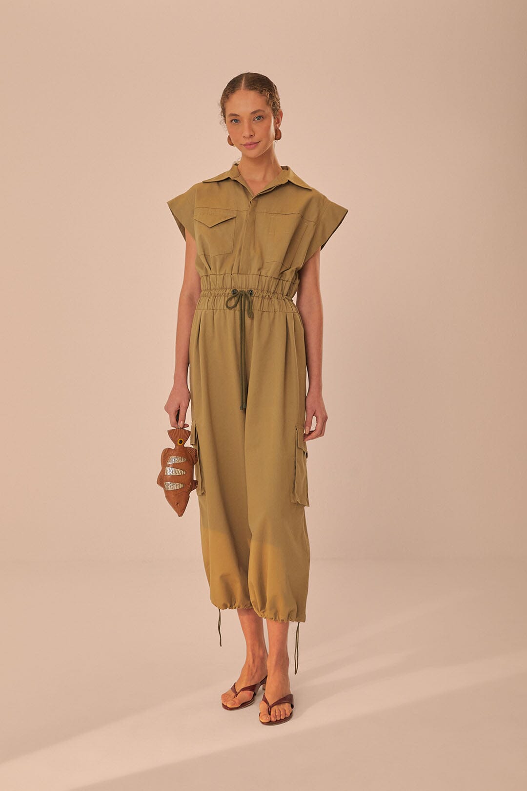 FARM Rio model wearing the Dark Green Utility Jumpsuit
