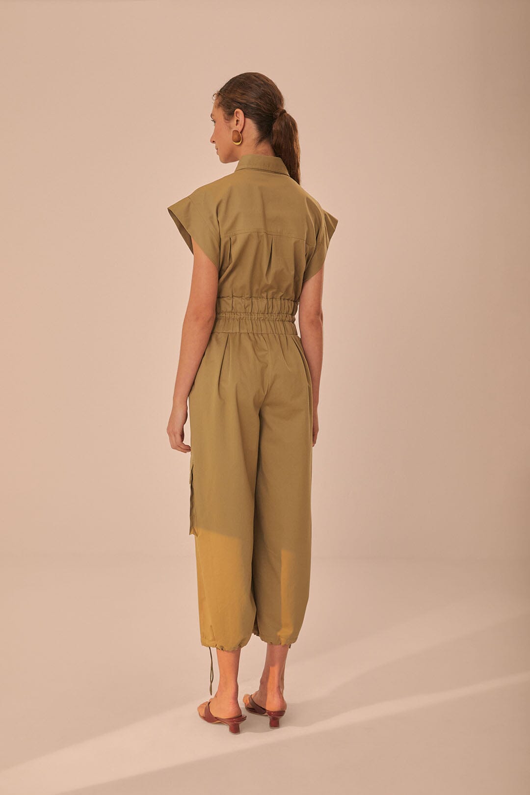 FARM Rio model wearing the Dark Green Utility Jumpsuit
