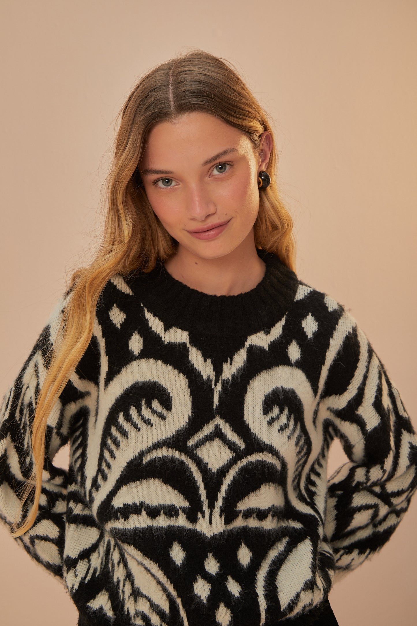 FARM Rio model wearing the Pineapple Ikat Knit Sweater