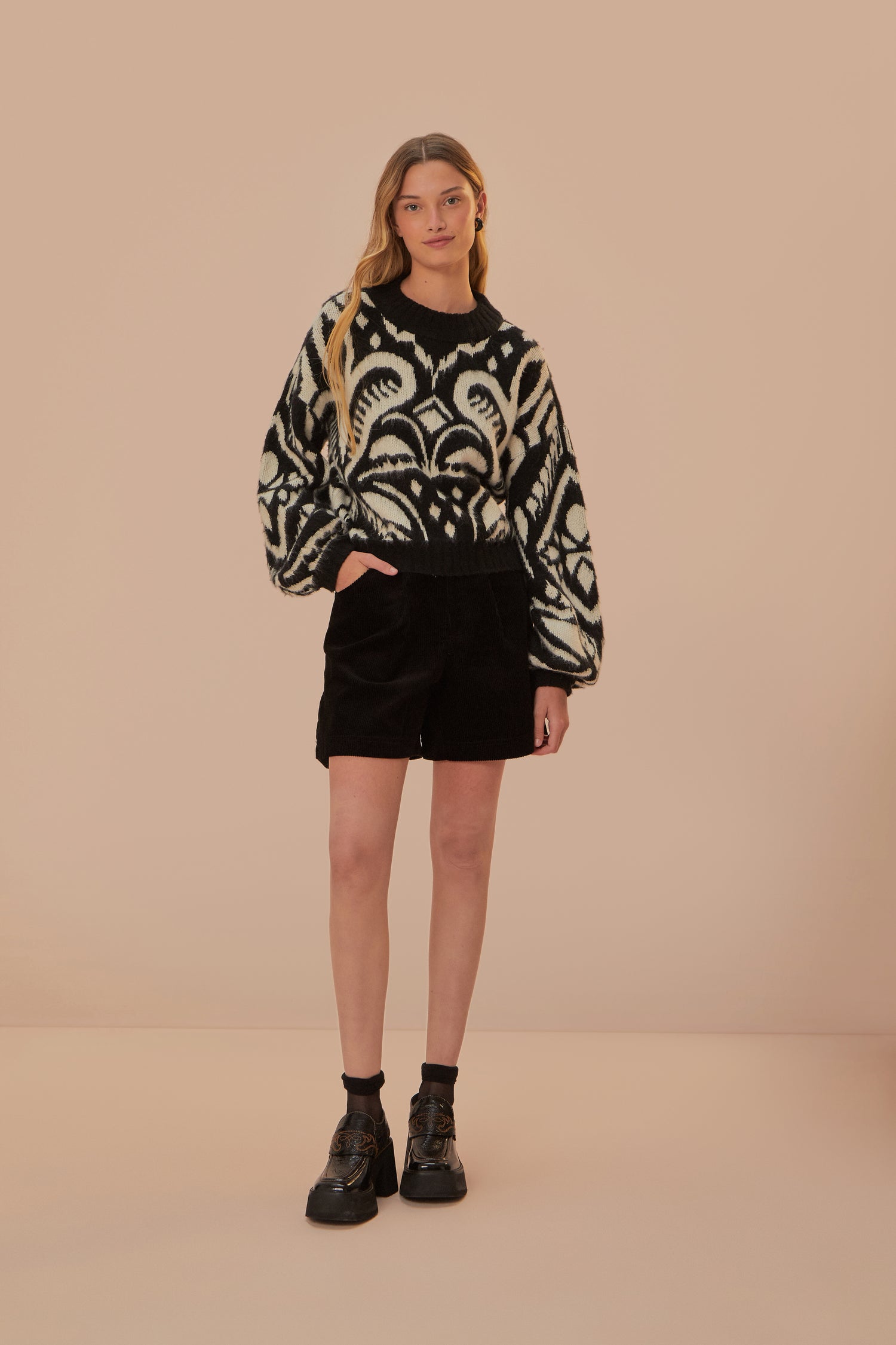 FARM Rio model wearing the Pineapple Ikat Knit Sweater