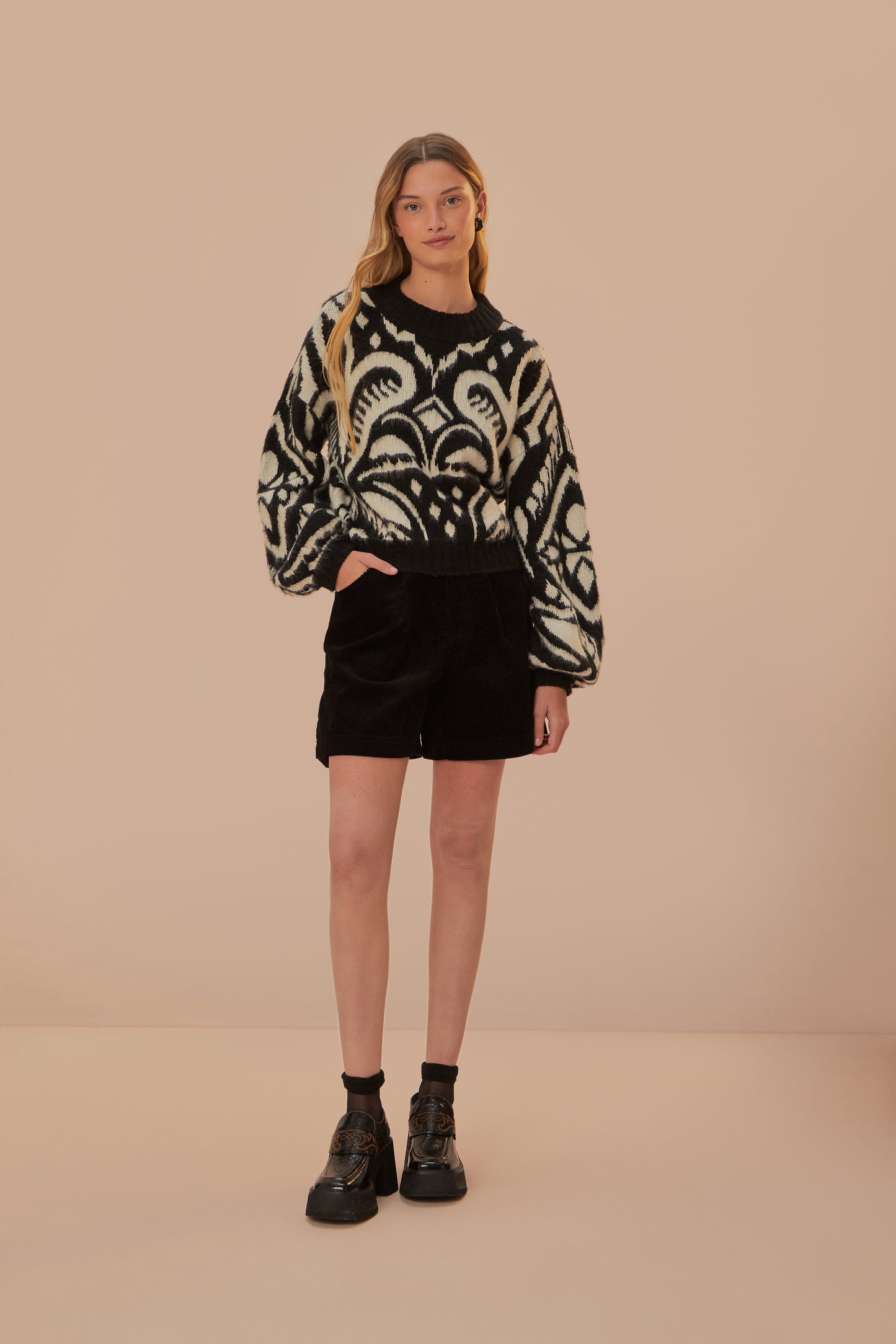 FARM Rio model wearing the Pineapple Ikat Knit Sweater