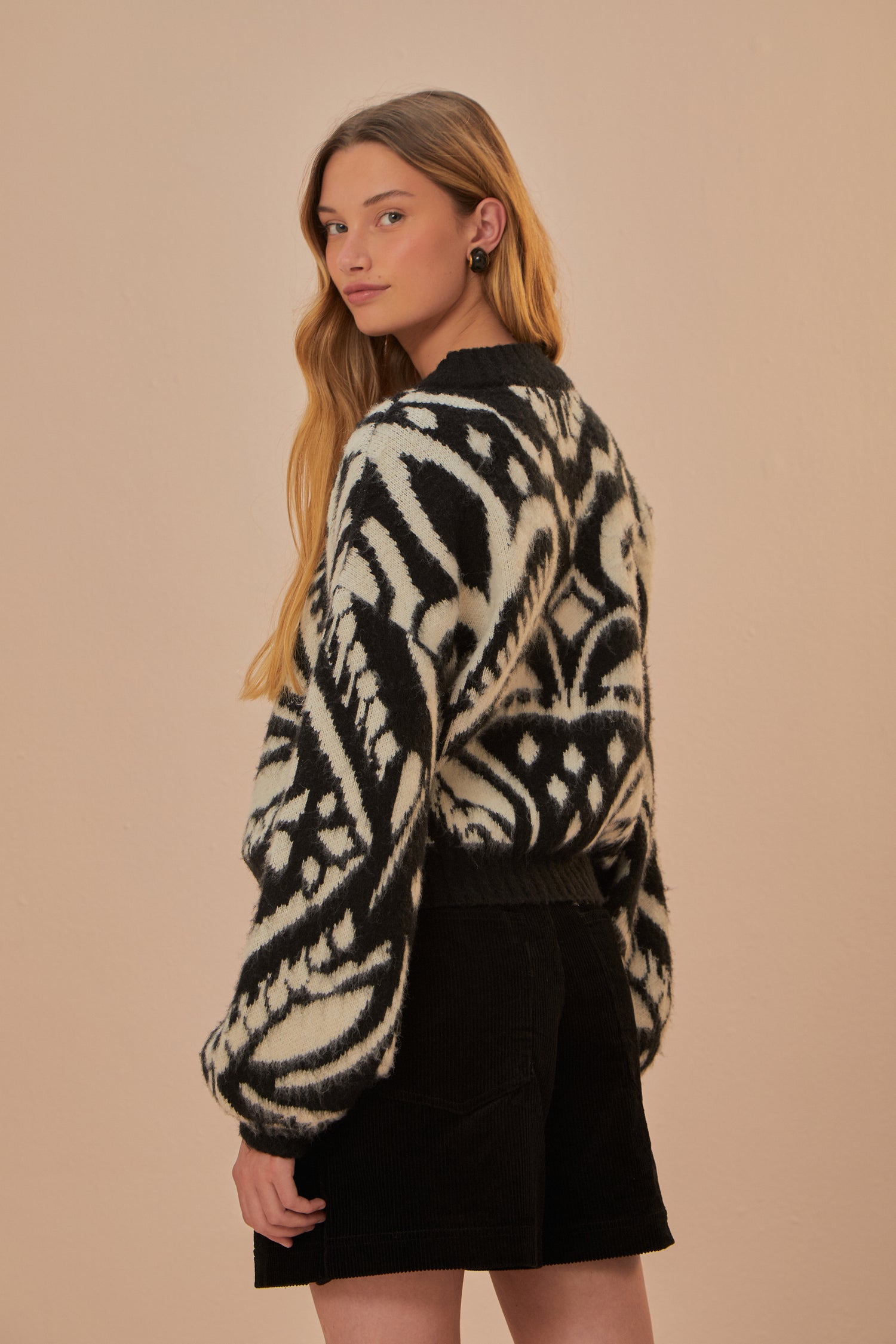 FARM Rio model wearing the Pineapple Ikat Knit Sweater