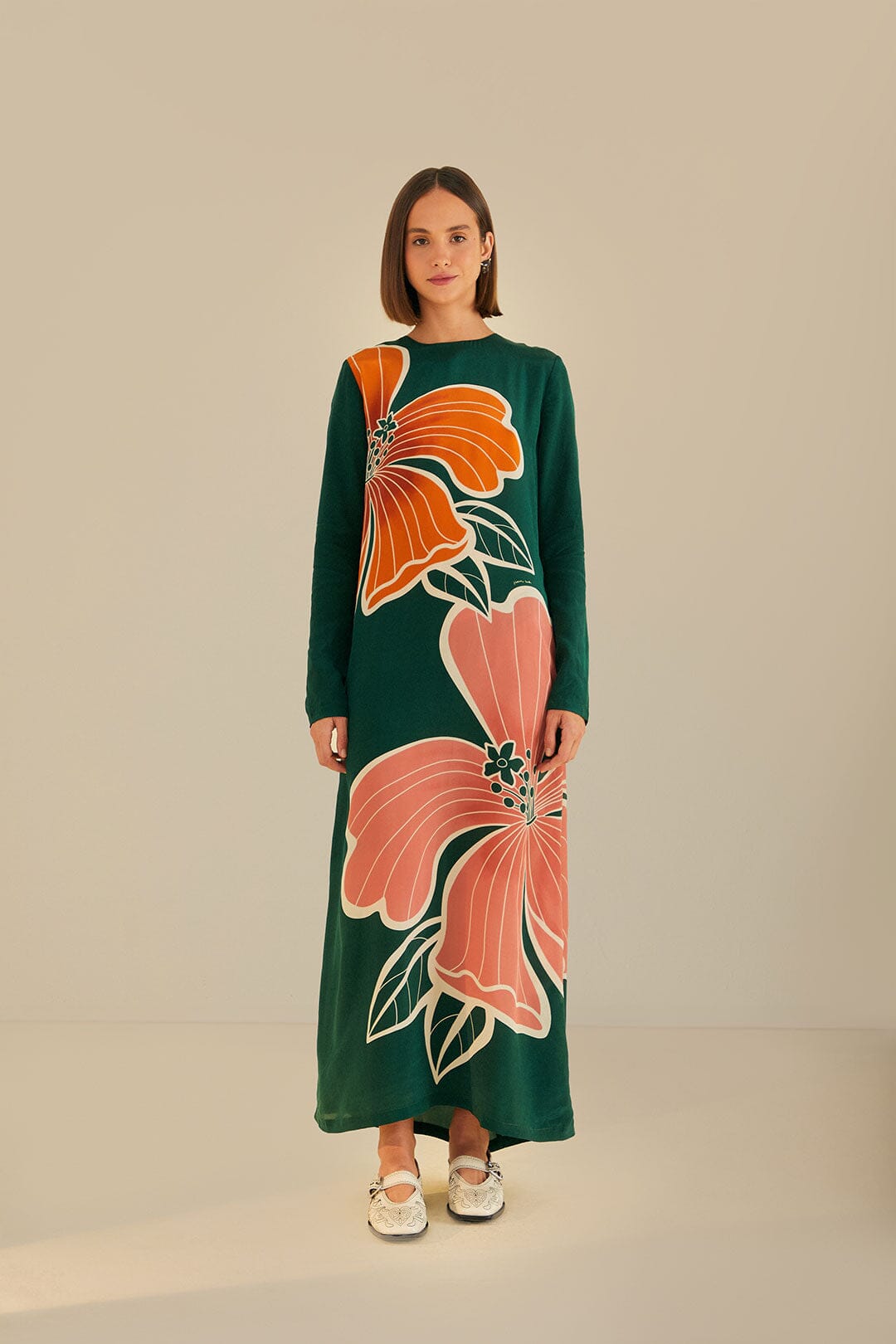 FARM Rio model wearing the Honolulu Flowers Green Long Sleeve Maxi Dress