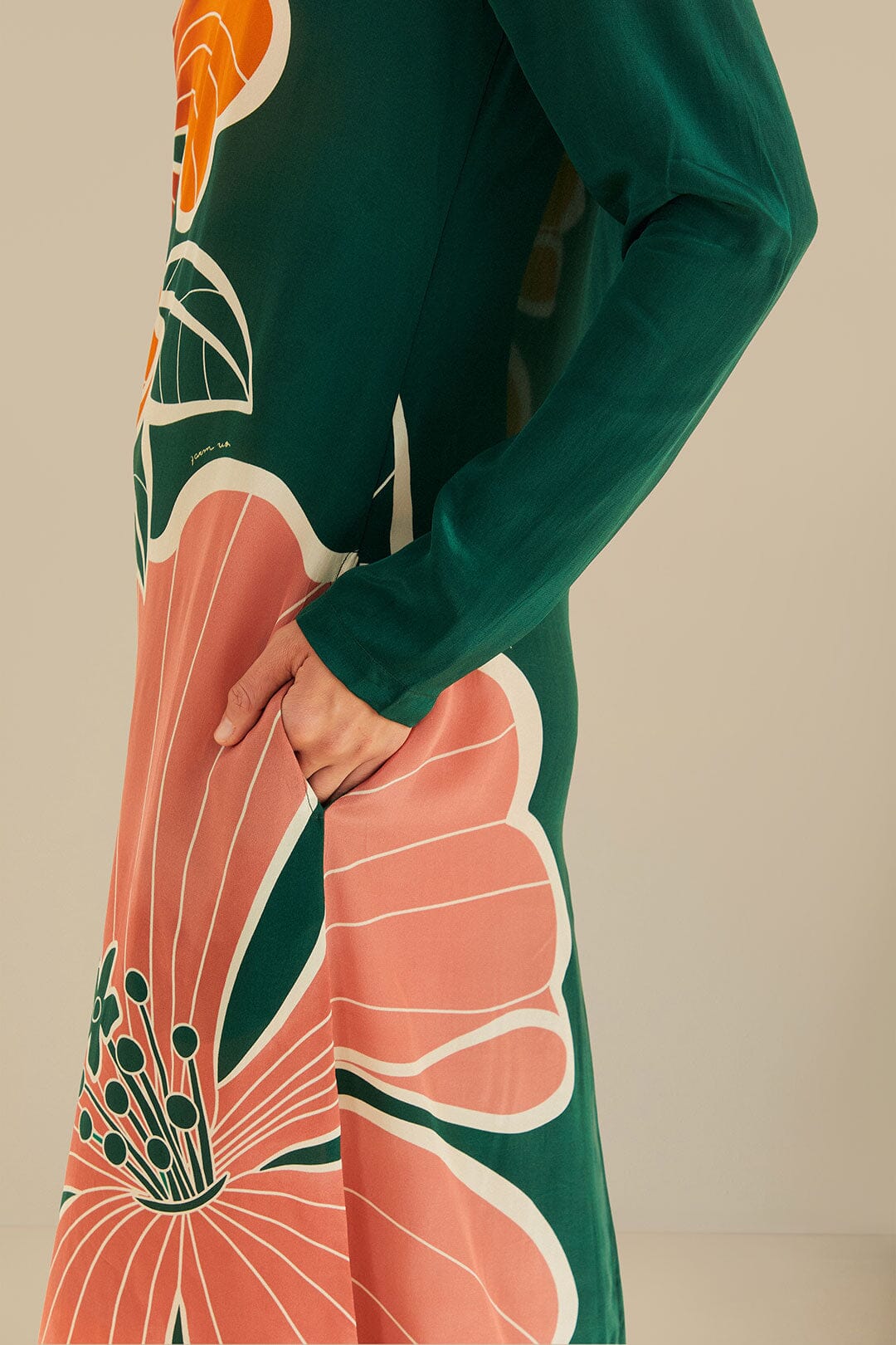 FARM Rio model wearing the Honolulu Flowers Green Long Sleeve Maxi Dress