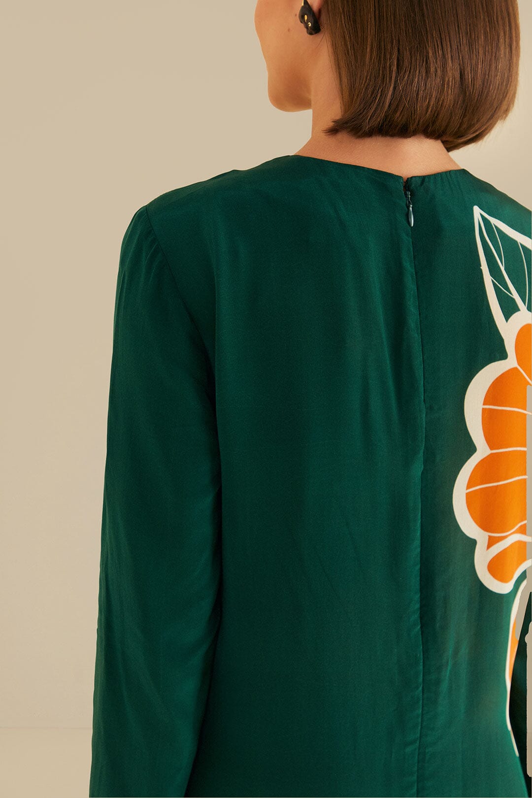 FARM Rio model wearing the Honolulu Flowers Green Long Sleeve Maxi Dress