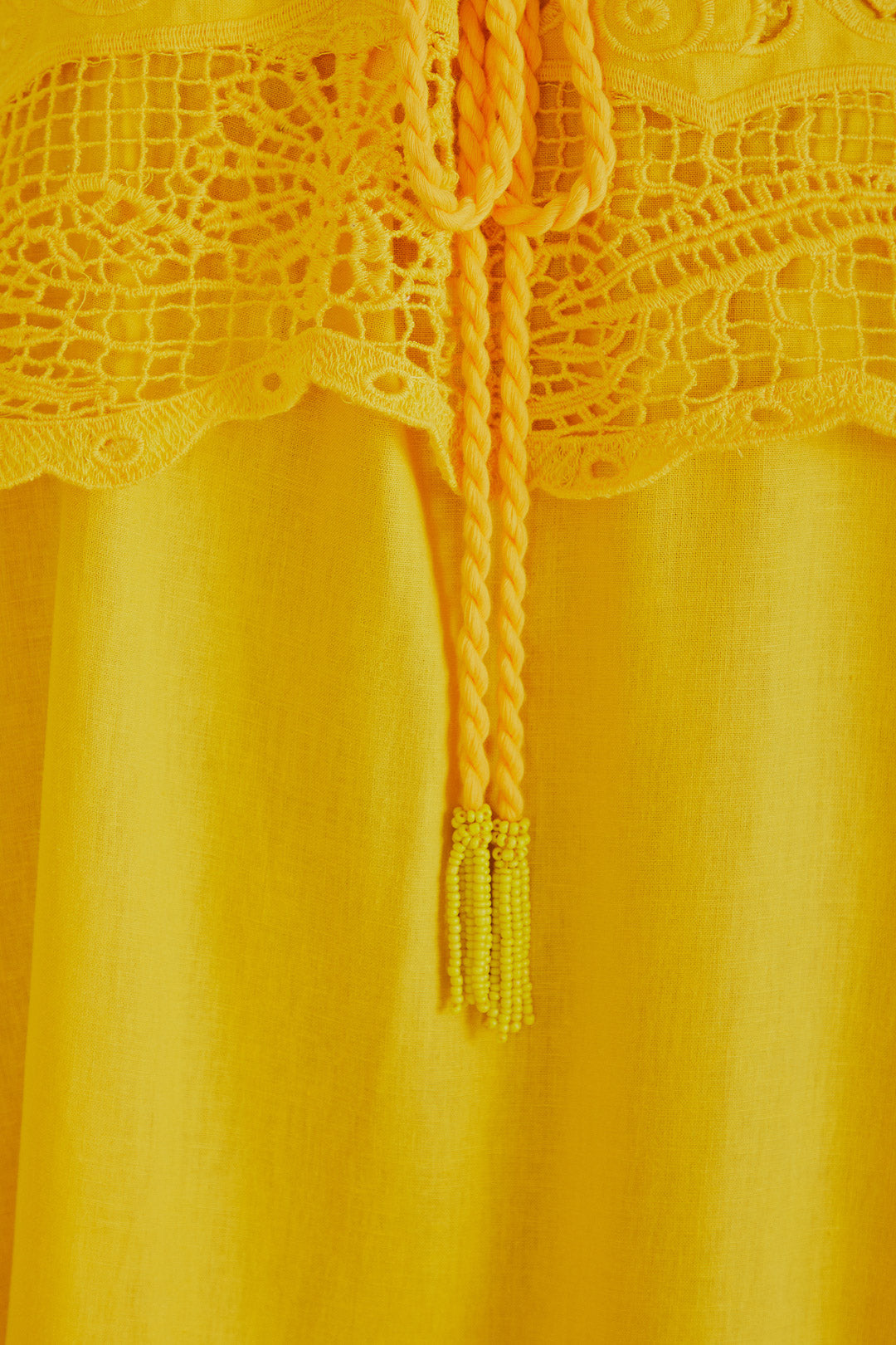 FARM Rio model wearing the Embroidery Guipure Yellow Mini Dress