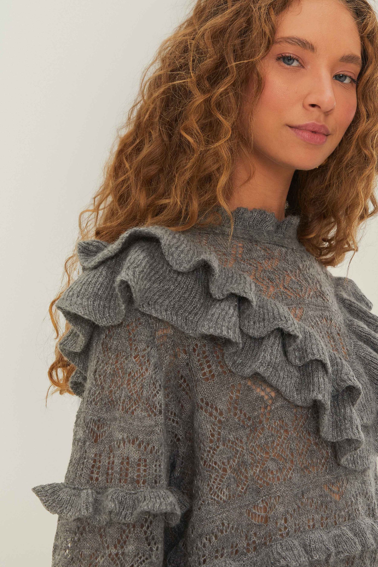 FARM Rio model wearing the Ruffles Knit Sweater