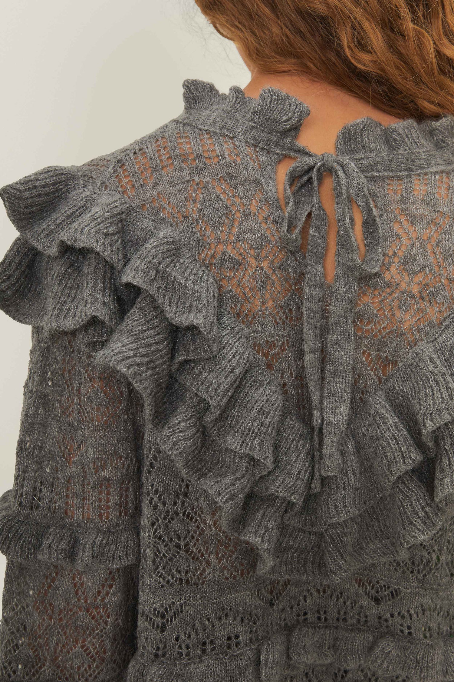 FARM Rio model wearing the Ruffles Knit Sweater