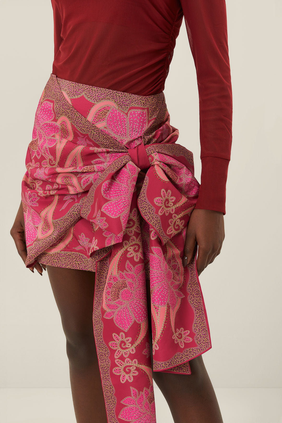 FARM Rio model wearing the Floral Glam Scarf Red Tie Gathering Mini Skirt