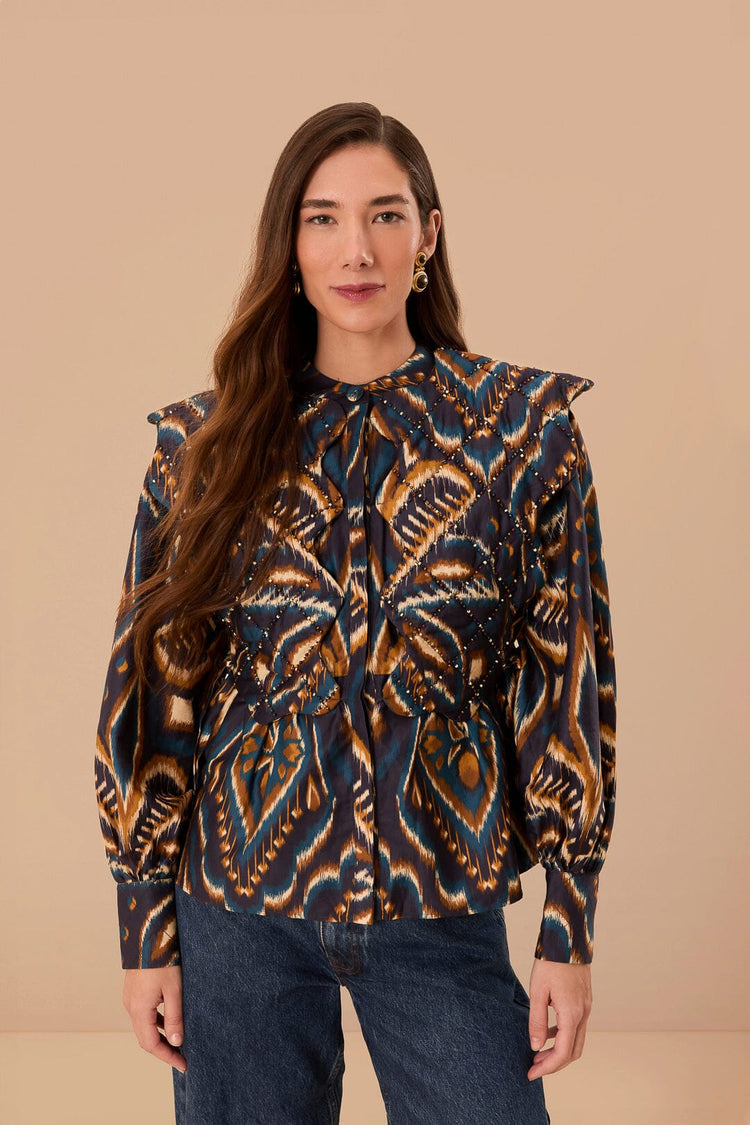 FARM Rio model wearing the Pineapple Ikat Blue Long Sleeve Matelasse Blouse