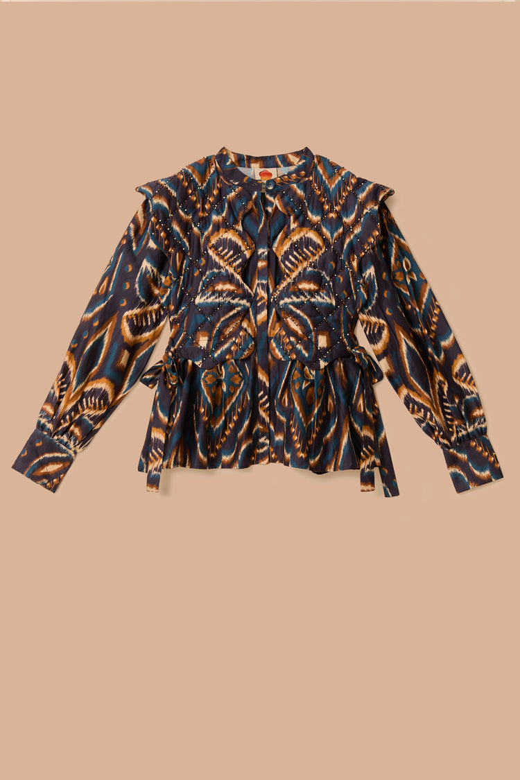 FARM Rio model wearing the Pineapple Ikat Blue Long Sleeve Matelasse Blouse