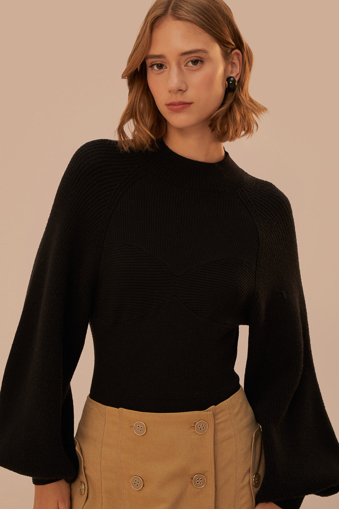 FARM Rio model wearing the Black Knit Bodysuit