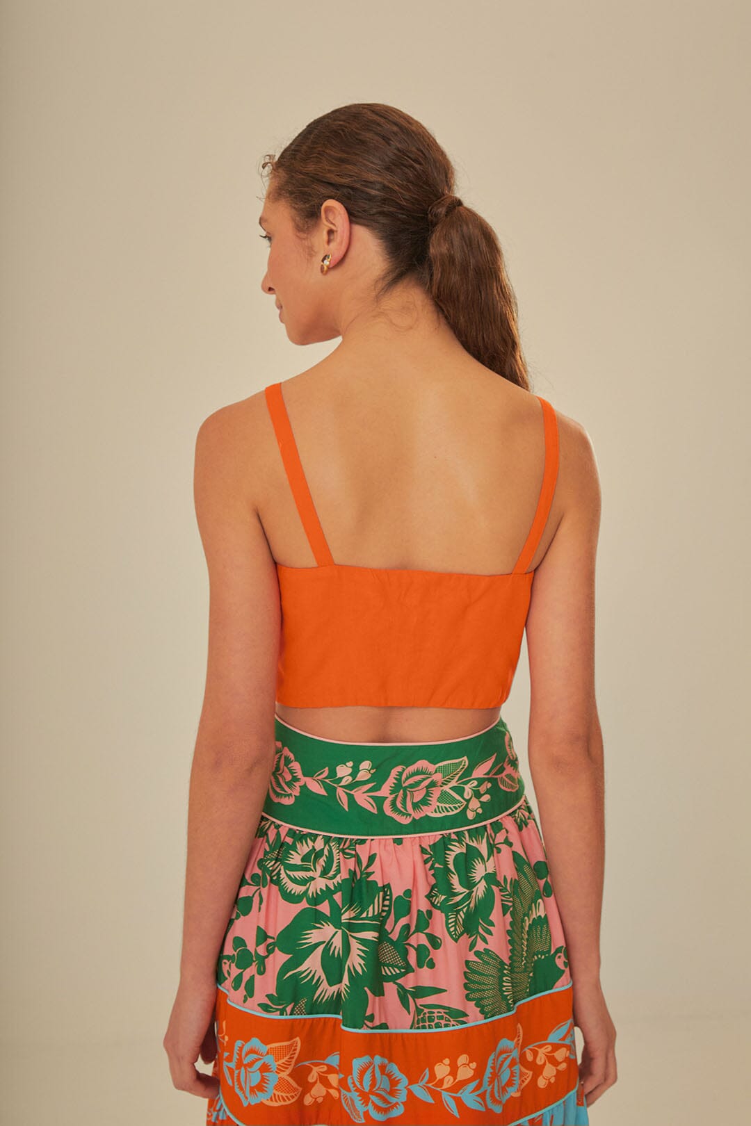 FARM Rio model wearing the Orange Front Bow Top