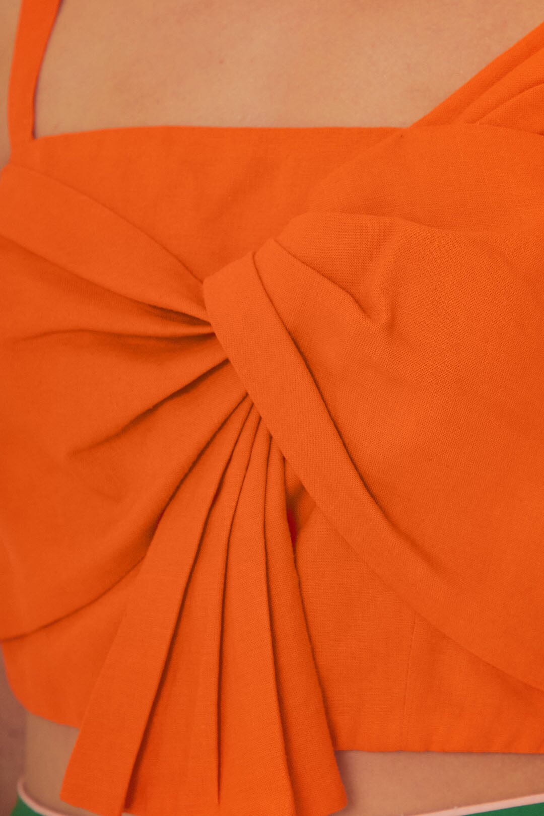 FARM Rio model wearing the Orange Front Bow Top