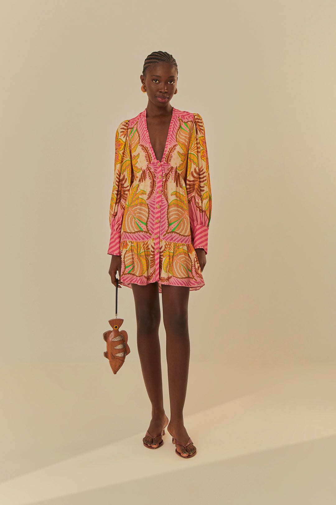 FARM Rio model wearing the Palm Scarf Sand Mini Dress