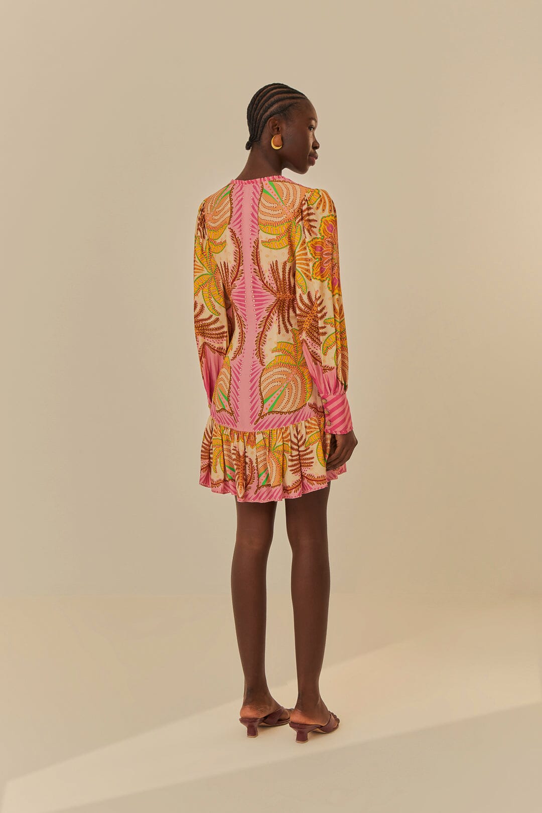 FARM Rio model wearing the Palm Scarf Sand Mini Dress