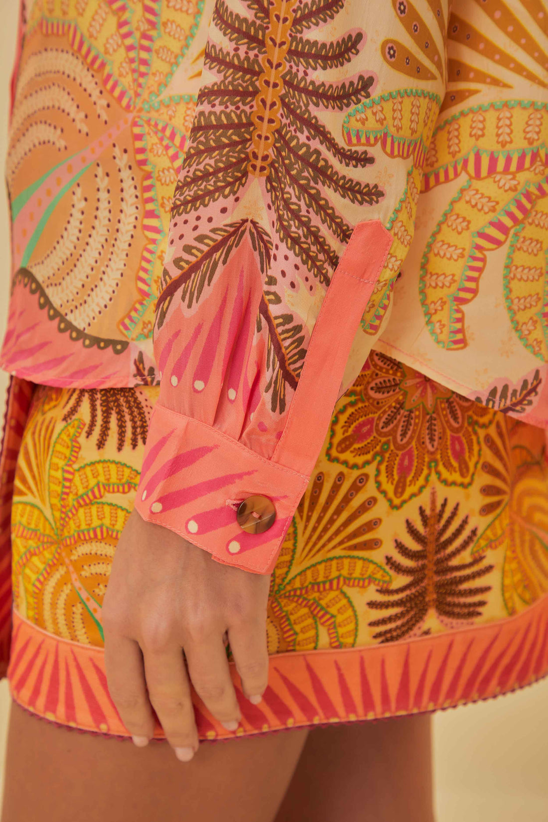 FARM Rio model wearing the Palm Scarf Sand Shirt