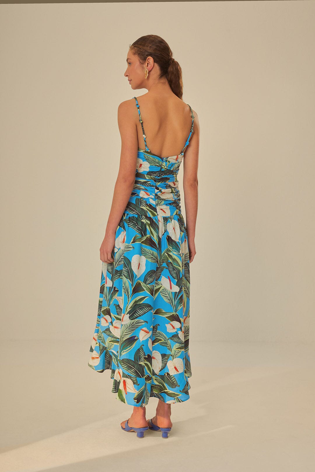 FARM Rio model wearing the Anthurium Garden Blue Cross Over Maxi Dress
