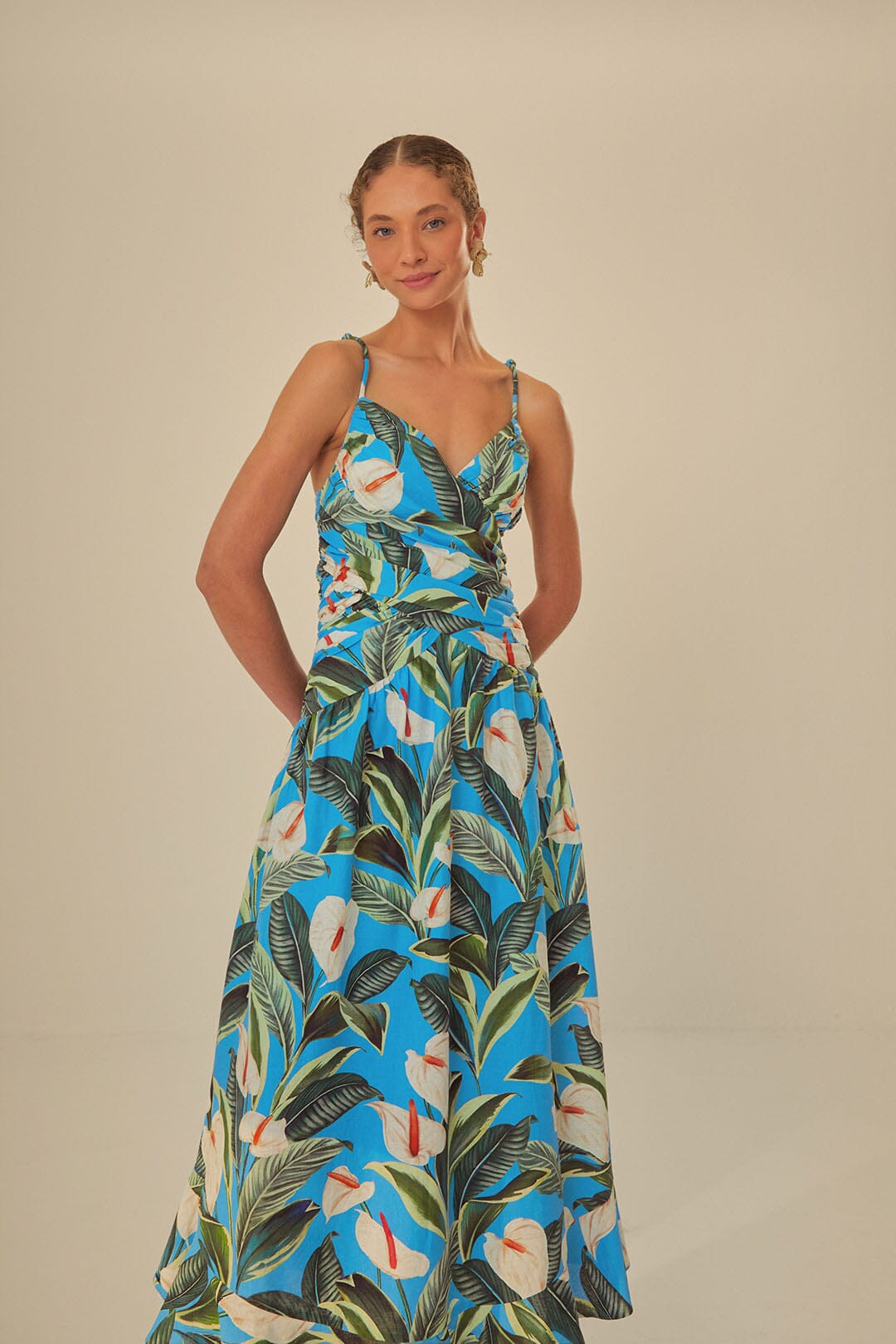 FARM Rio model wearing the Anthurium Garden Blue Cross Over Maxi Dress