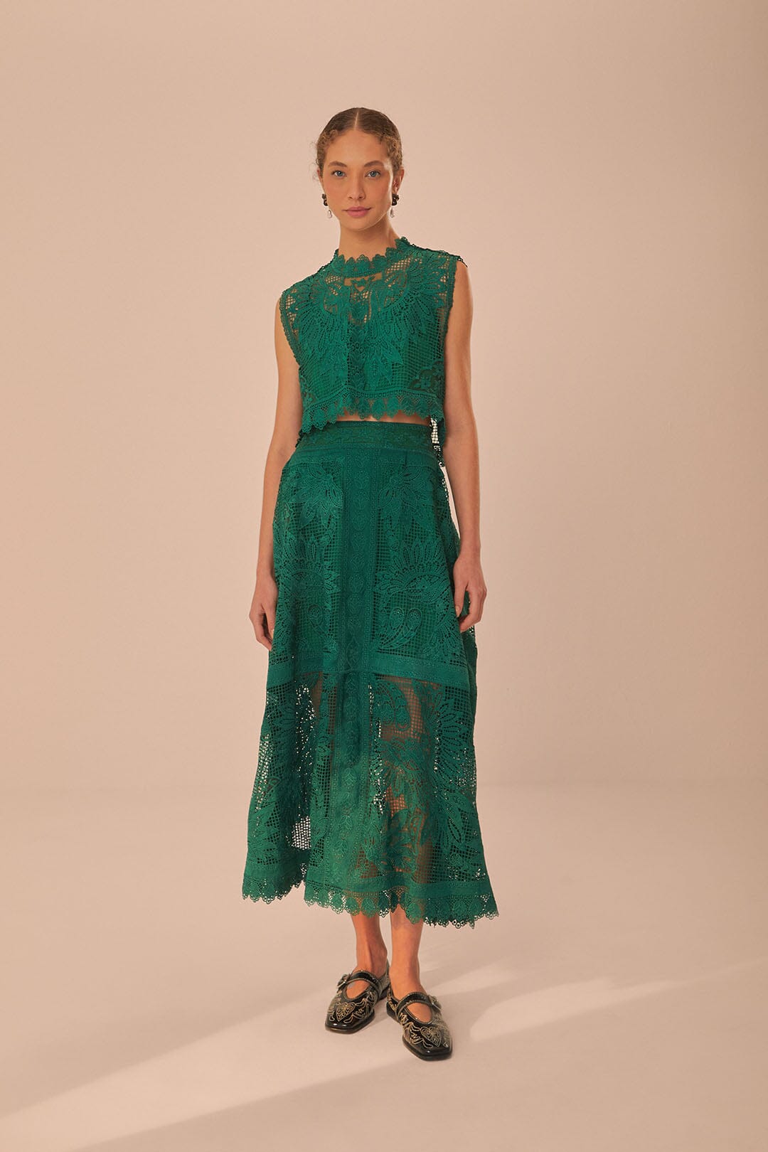 FARM Rio model wearing the Green Toucan Guipure Midi Skirt