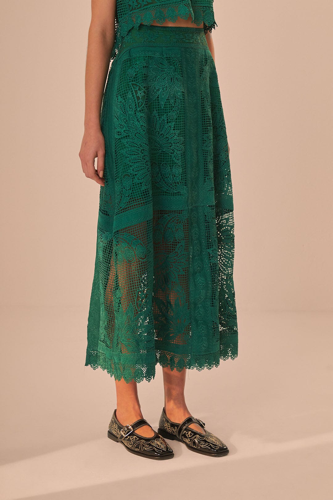 FARM Rio model wearing the Green Toucan Guipure Midi Skirt