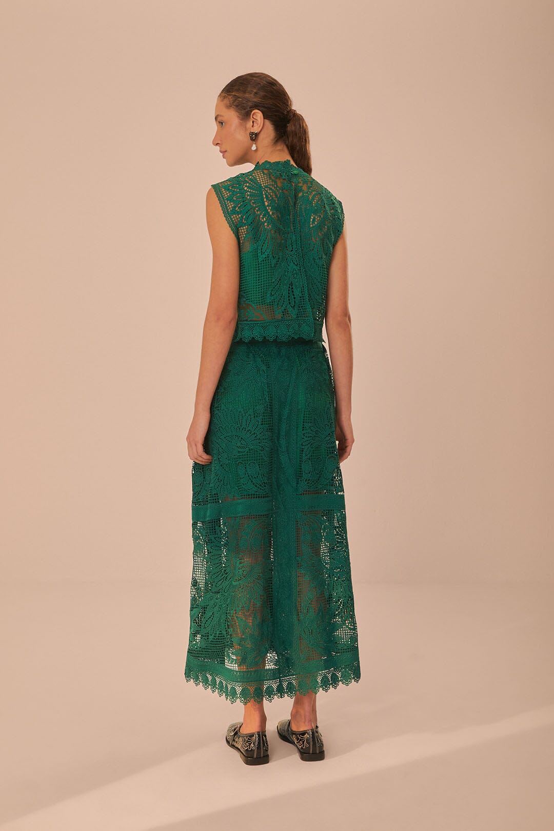 FARM Rio model wearing the Green Toucan Guipure Midi Skirt
