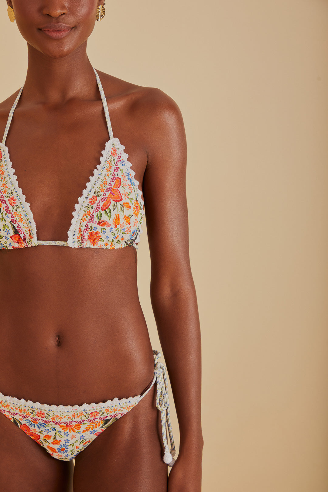 FARM Rio model wearing the Bloom Garden Side Tie Bikini Bottom