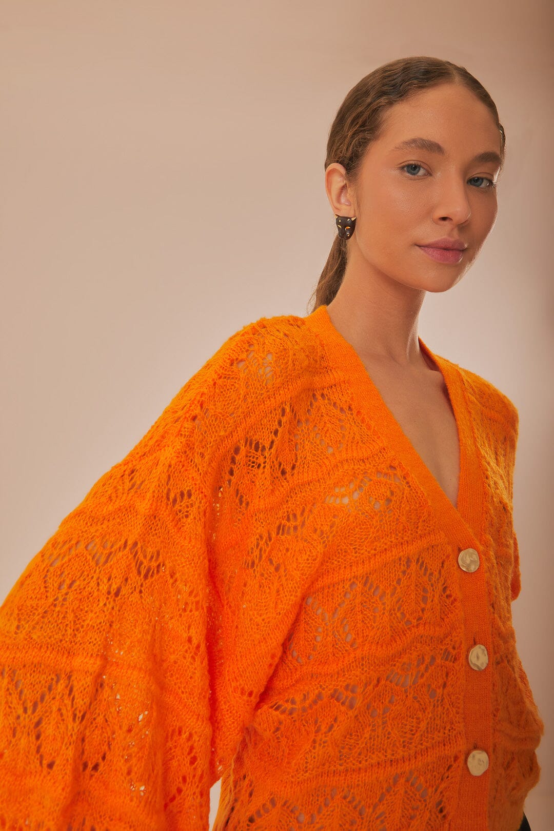FARM Rio model wearing the Orange Textured Knit Cardigan