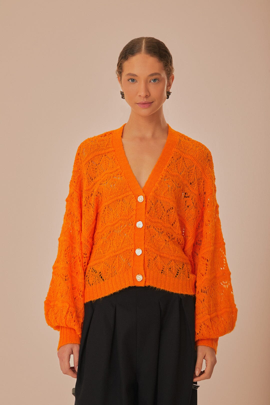 FARM Rio model wearing the Orange Textured Knit Cardigan