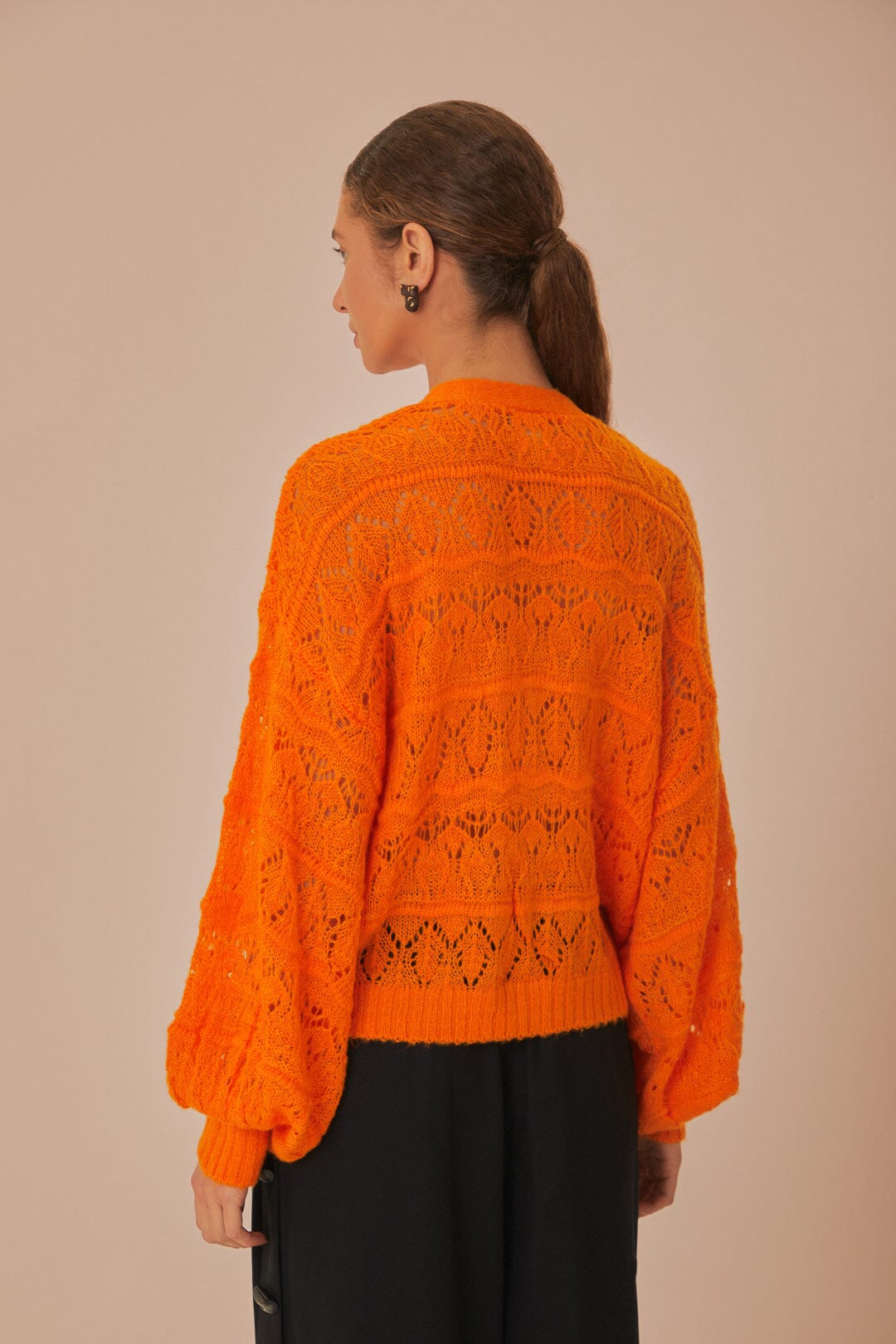 FARM Rio model wearing the Orange Textured Knit Cardigan