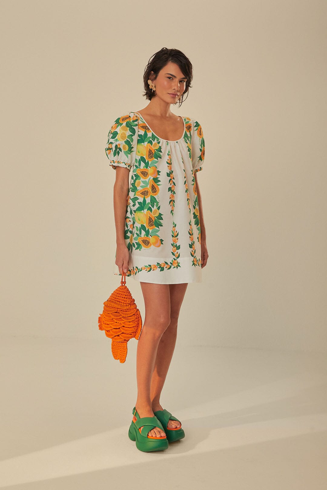 FARM Rio model wearing the Papaya Salad Scarf Mini Dress