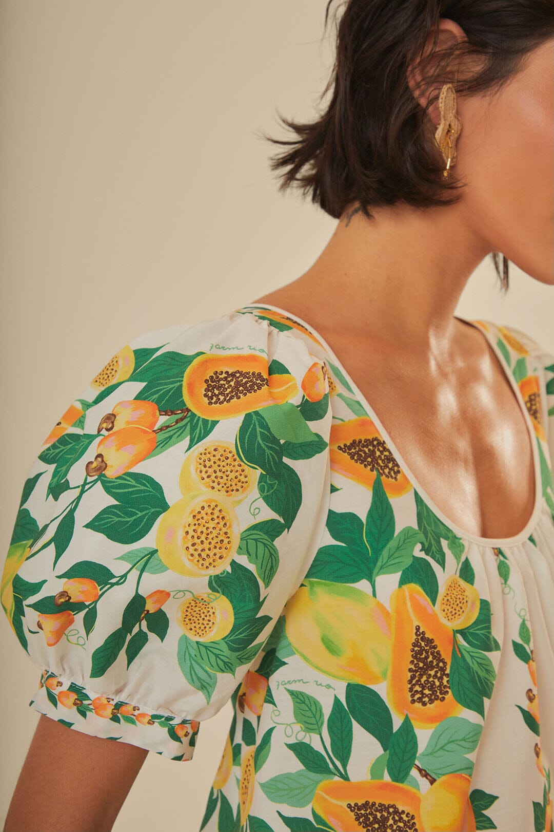 FARM Rio model wearing the Papaya Salad Scarf Mini Dress