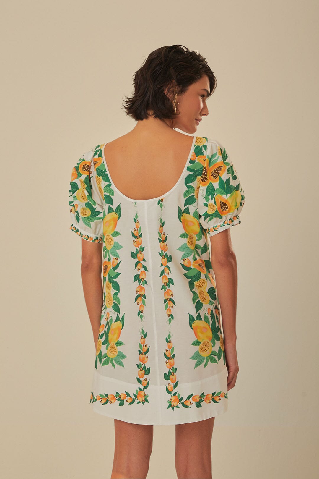 FARM Rio model wearing the Papaya Salad Scarf Mini Dress
