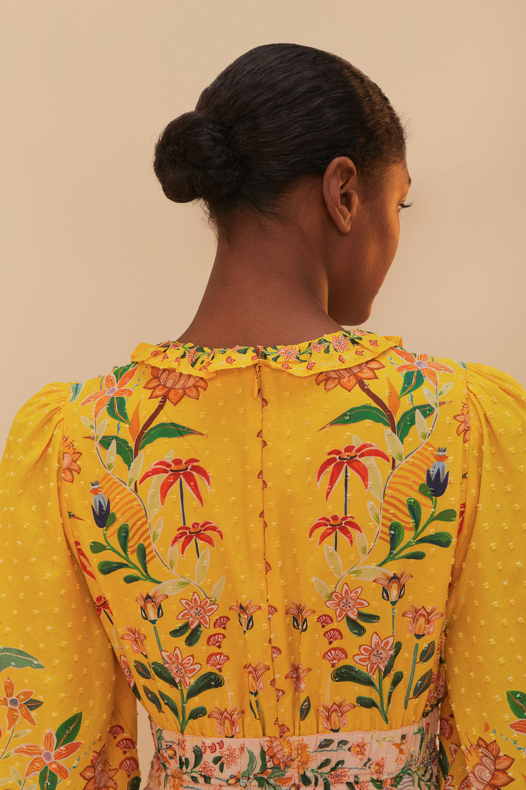 FARM Rio model wearing the Mixed Delicate Flowers Long Sleeve Maxi Dress
