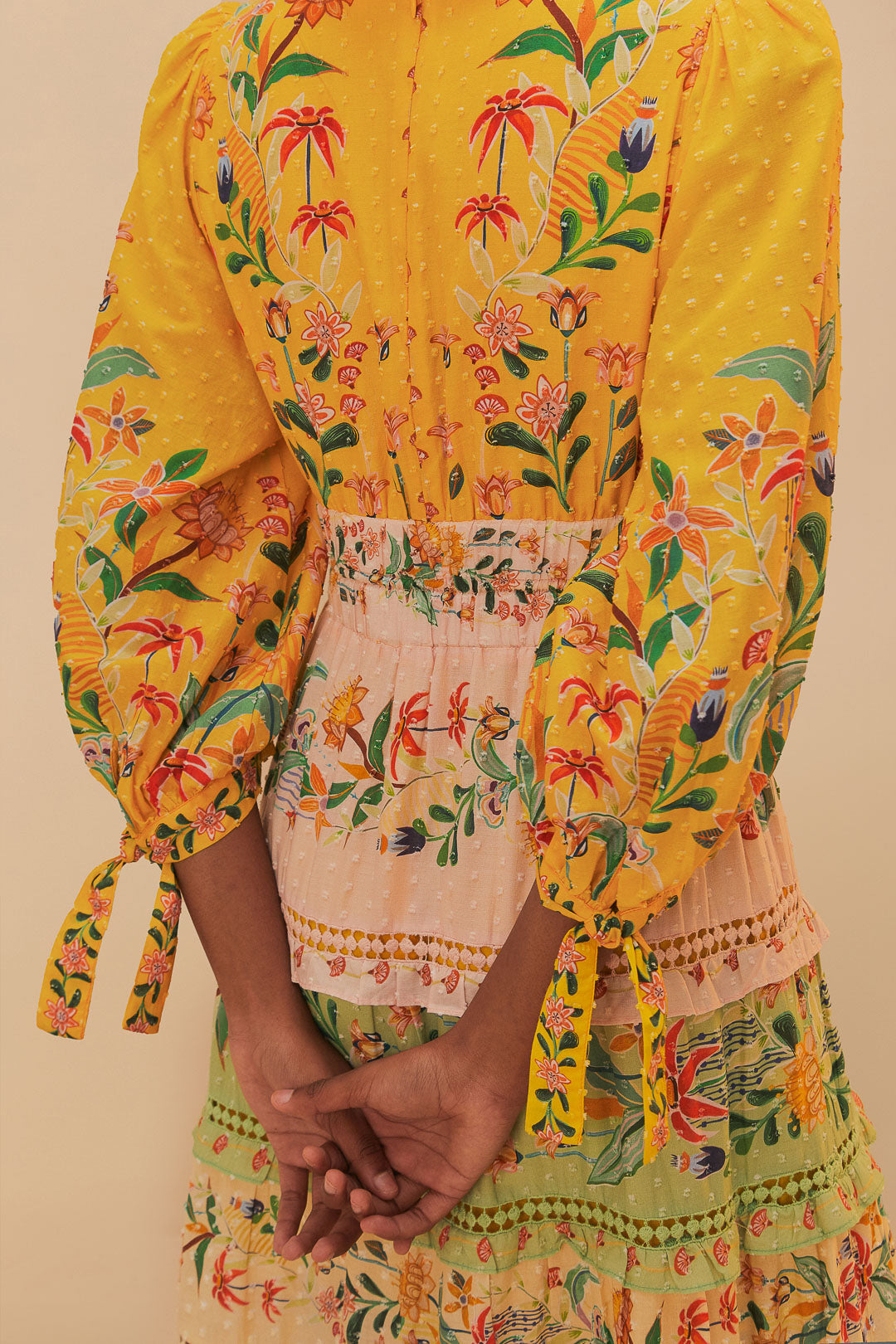 FARM Rio model wearing the Mixed Delicate Flowers Long Sleeve Maxi Dress