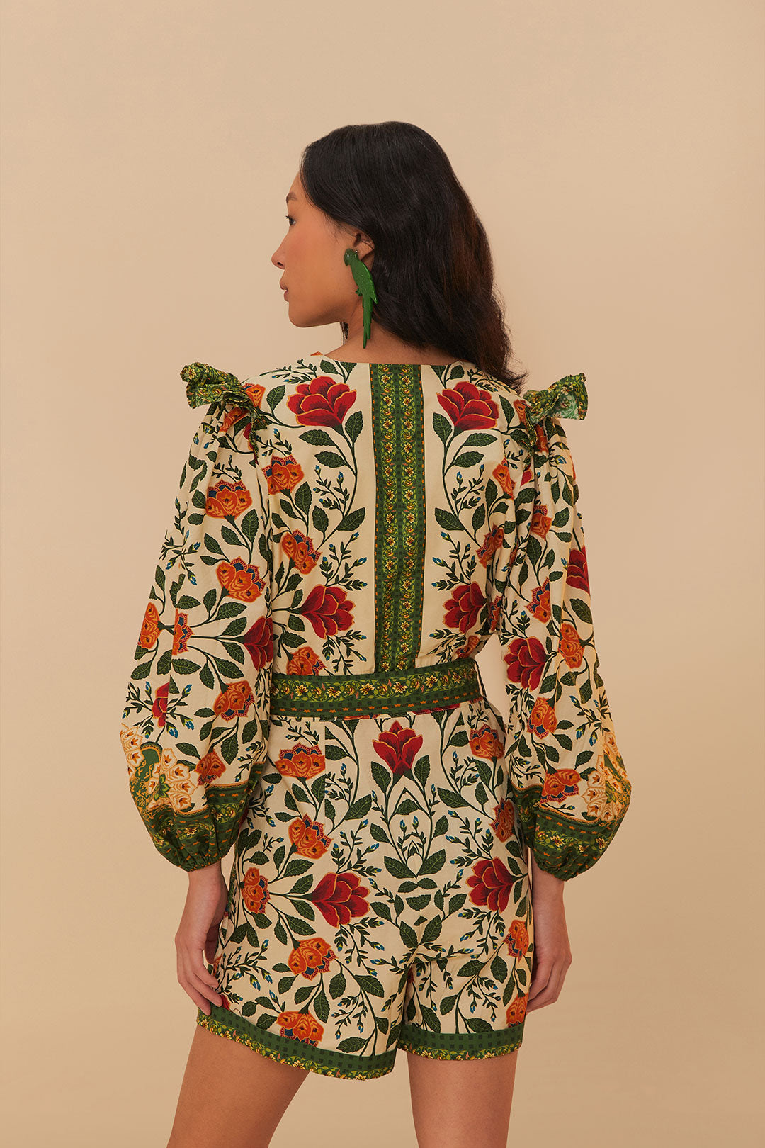 FARM Rio model wearing the Garden Tapestry Sand Romper