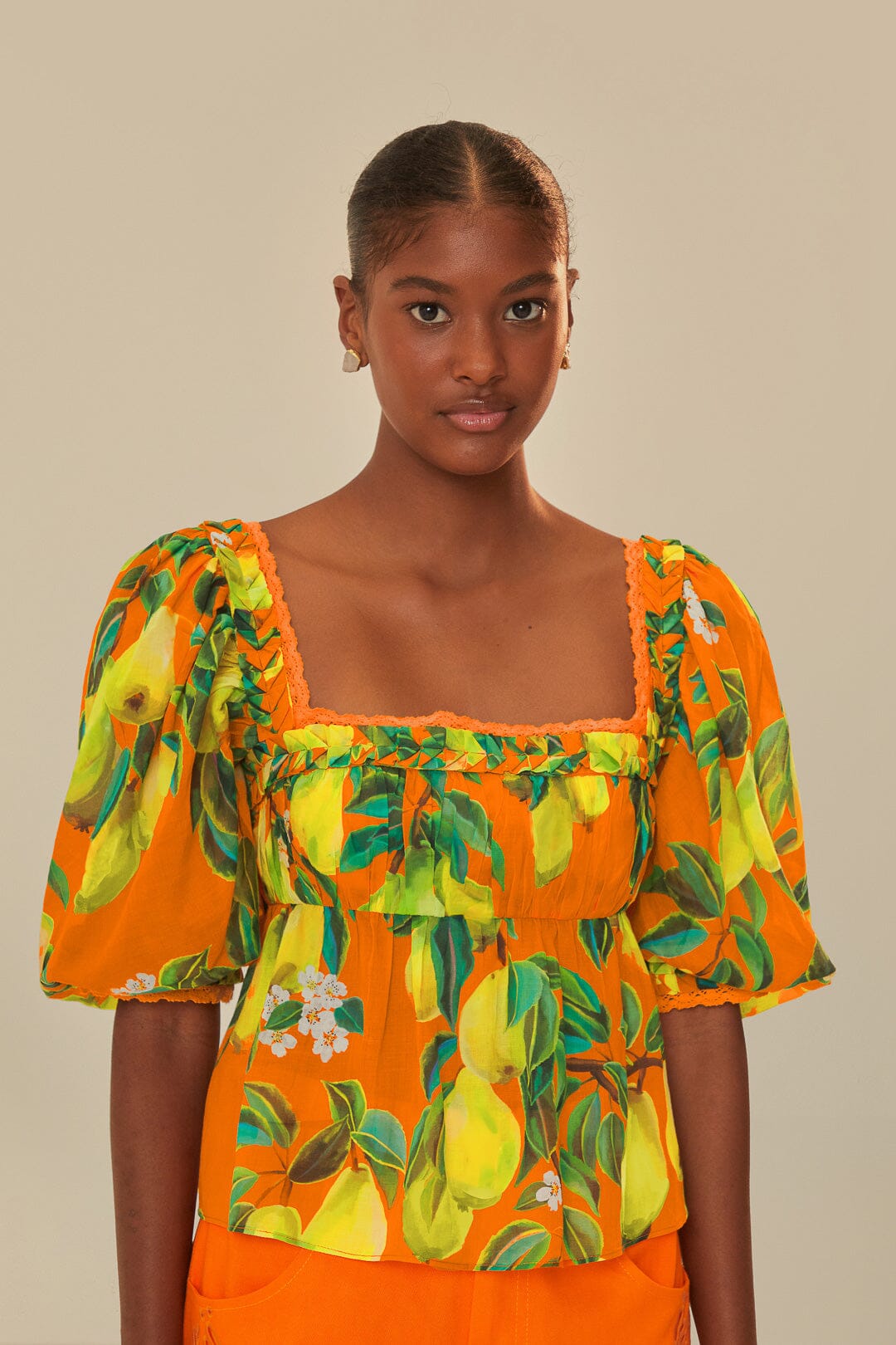 FARM Rio model wearing the Orange Chic Pears Short Sleeves Blouse