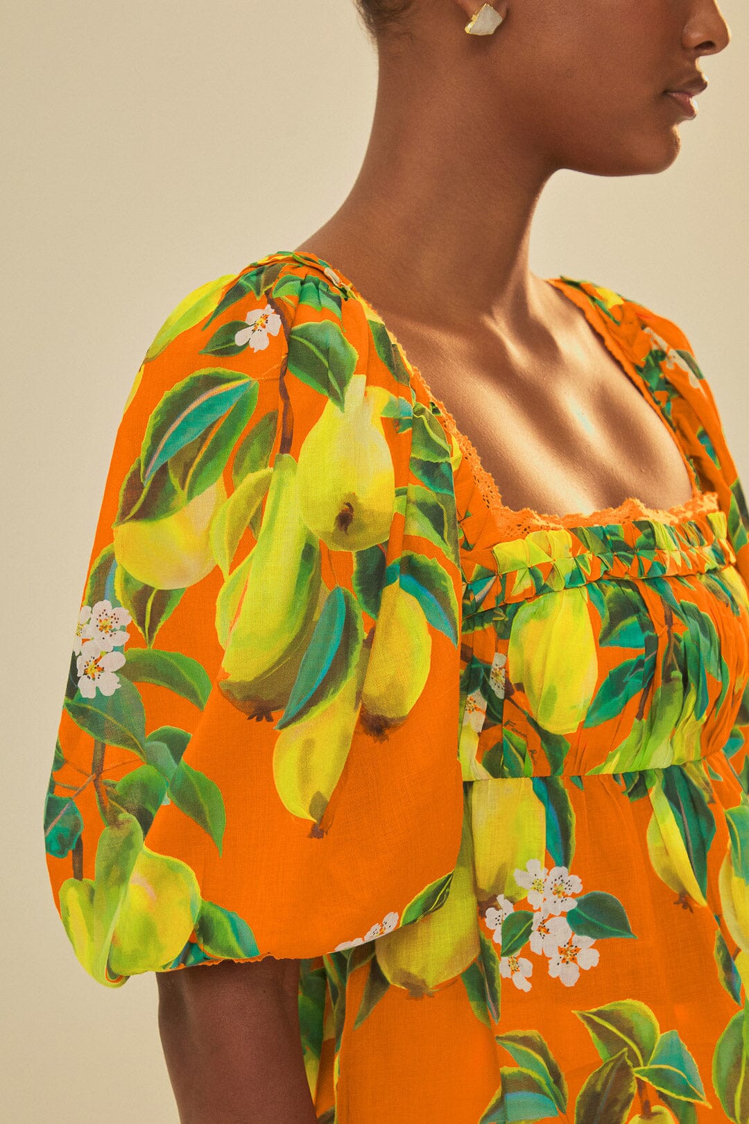 FARM Rio model wearing the Orange Chic Pears Short Sleeves Blouse